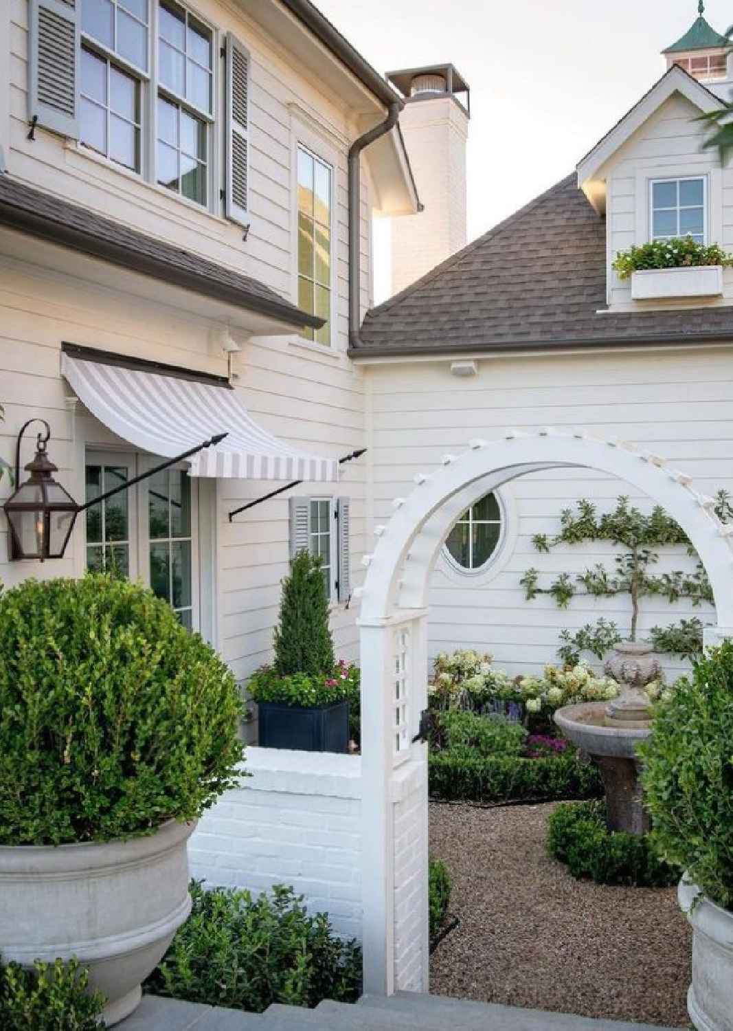 @fromthegrounduplandscape - stunning garden and white cottage exterior. #classicarchitecture #whitehouses #whitehouseexteriors