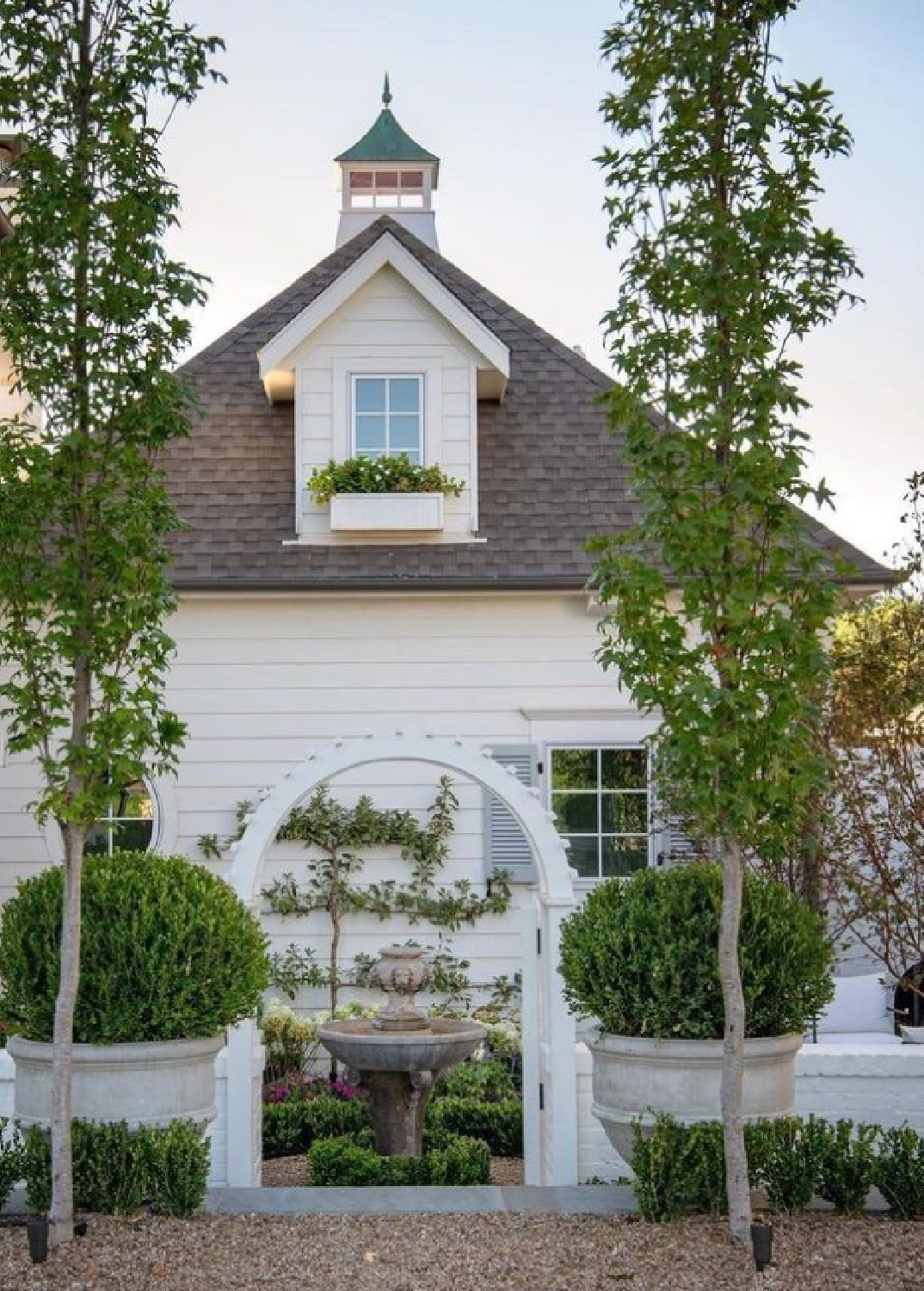 @fromthegrounduplandscape - beautiful white cottage and garden with boxwood. #whitecottages #boxwoodlovers