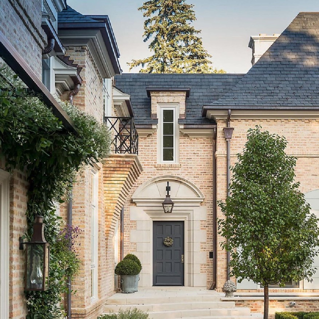 @pursleydixon - Stunning architecture on this pale red brick stone house exterior with black door. #traditionalhomes #brickhouseexteriors