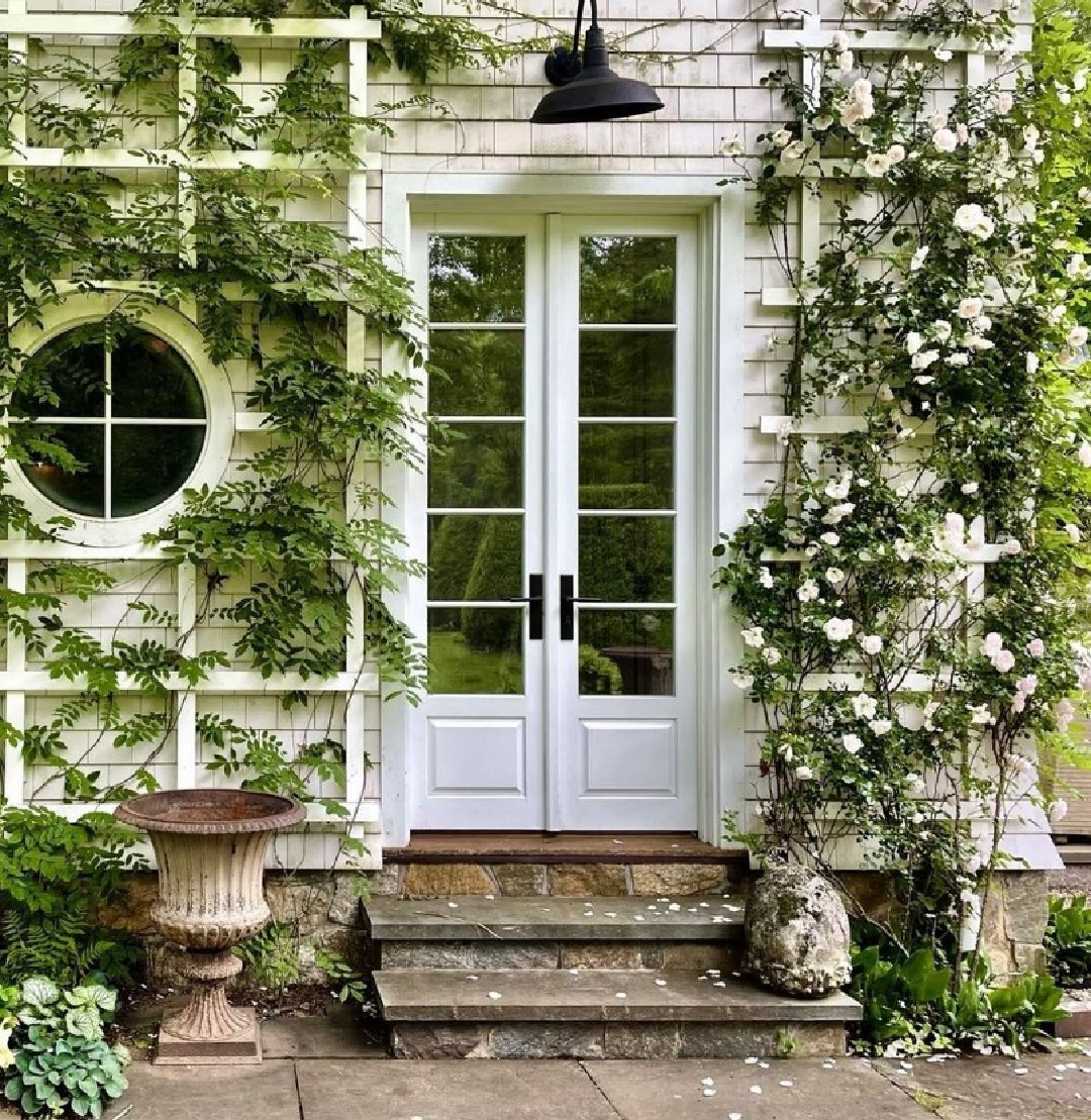 @stephensillassociates - Beautiful white shingle style house with climbing roses and French doors. #frenchfarmhouse #frenchcountry #climbingroses