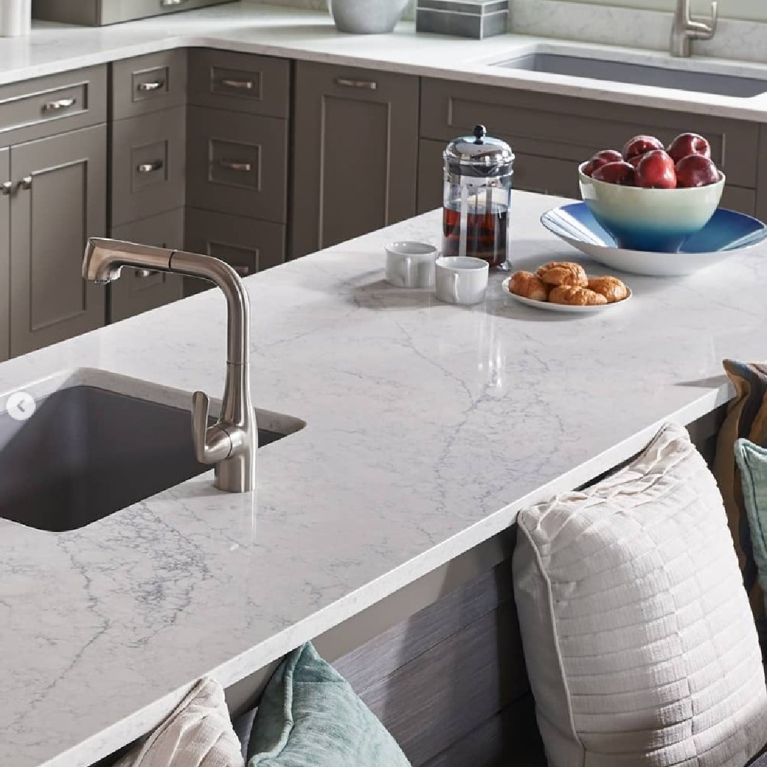Karis quartz (Viatera white countertops) in a kitchen with gray cabinets. #karisquartz #viaterausa
