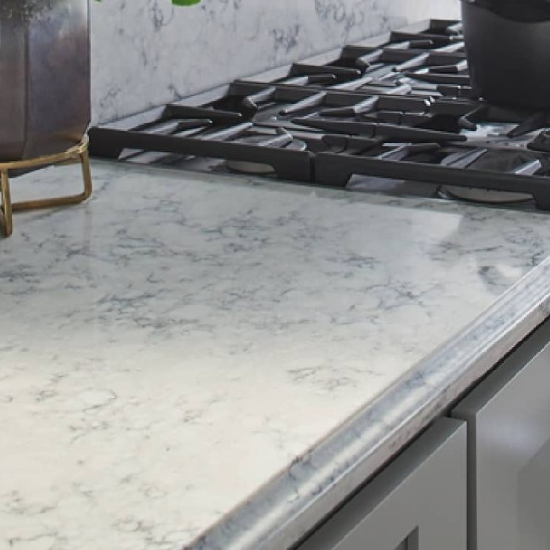 Rococo quartz (Viatera white countertops) in a kitchen. #rococoquartz