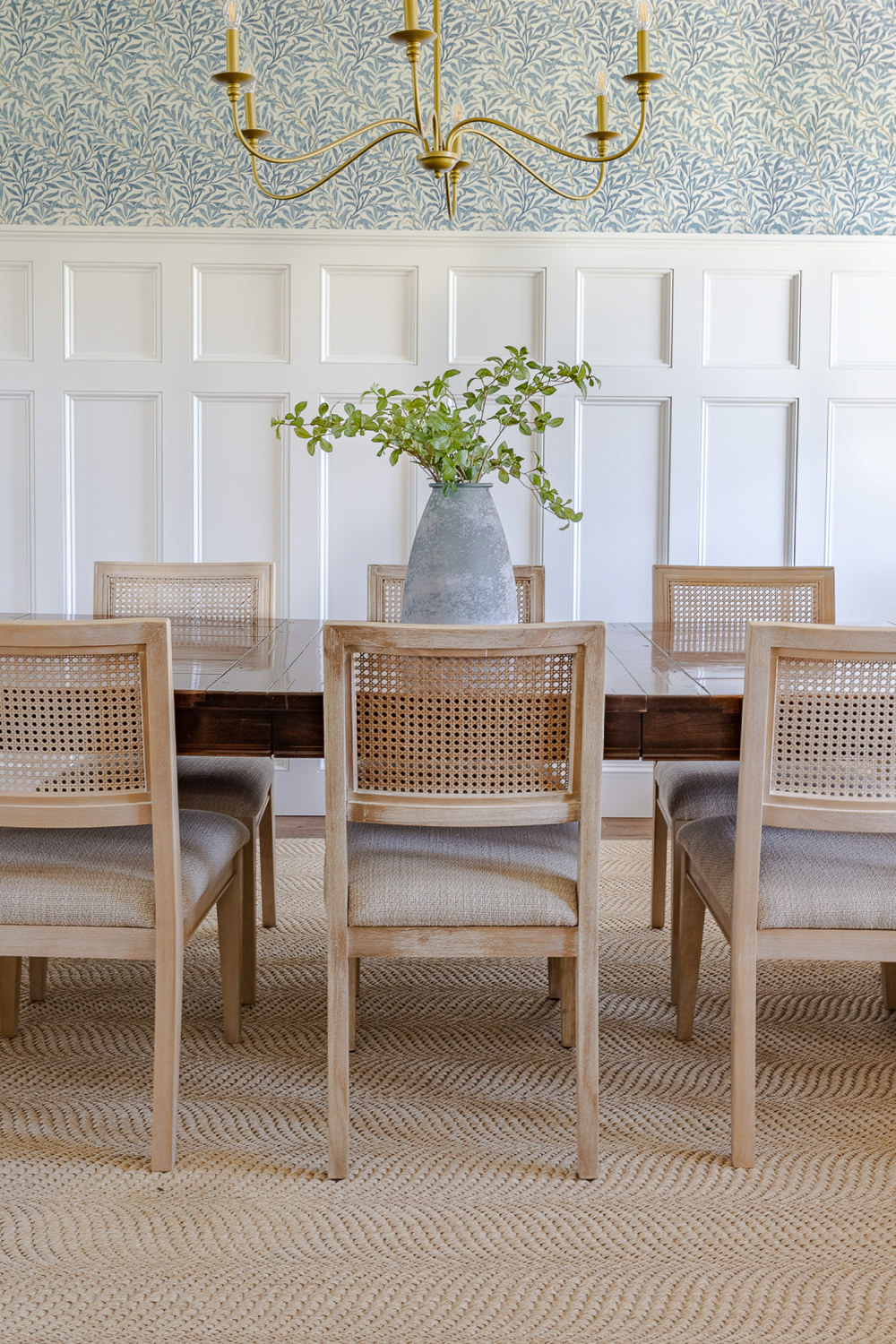 Chantilly Lace (Benjamin Moore) painted paneling in a beautiful dining room by Amelia Lawrence Style. #chantillylace