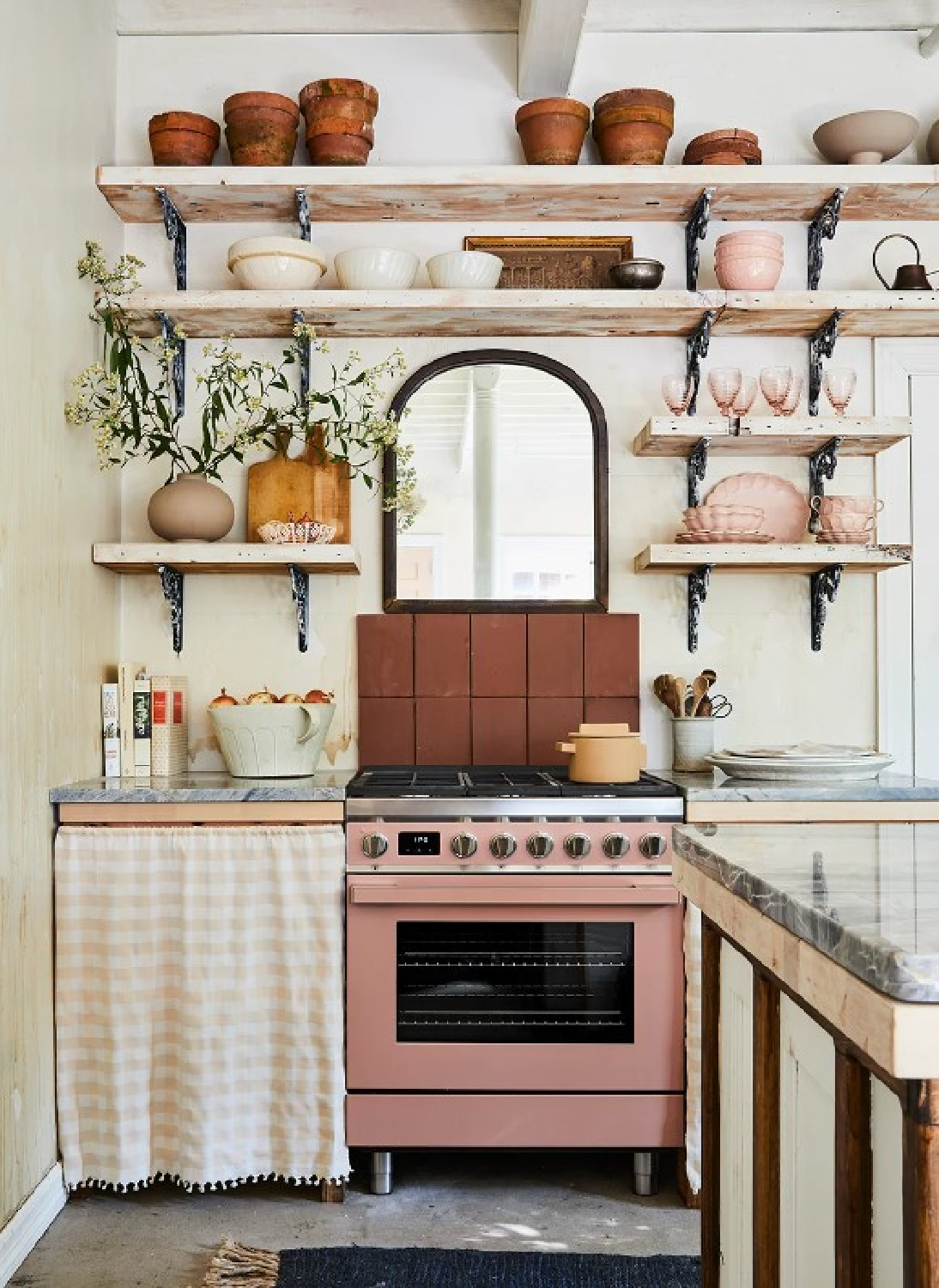 Leanne Ford designed kitchen with dusty rose range in her Pittsburgh guest cottage - photo by Erin Kelly for Pittsburgh Post Gazette. #modernrustic #vintagestyle