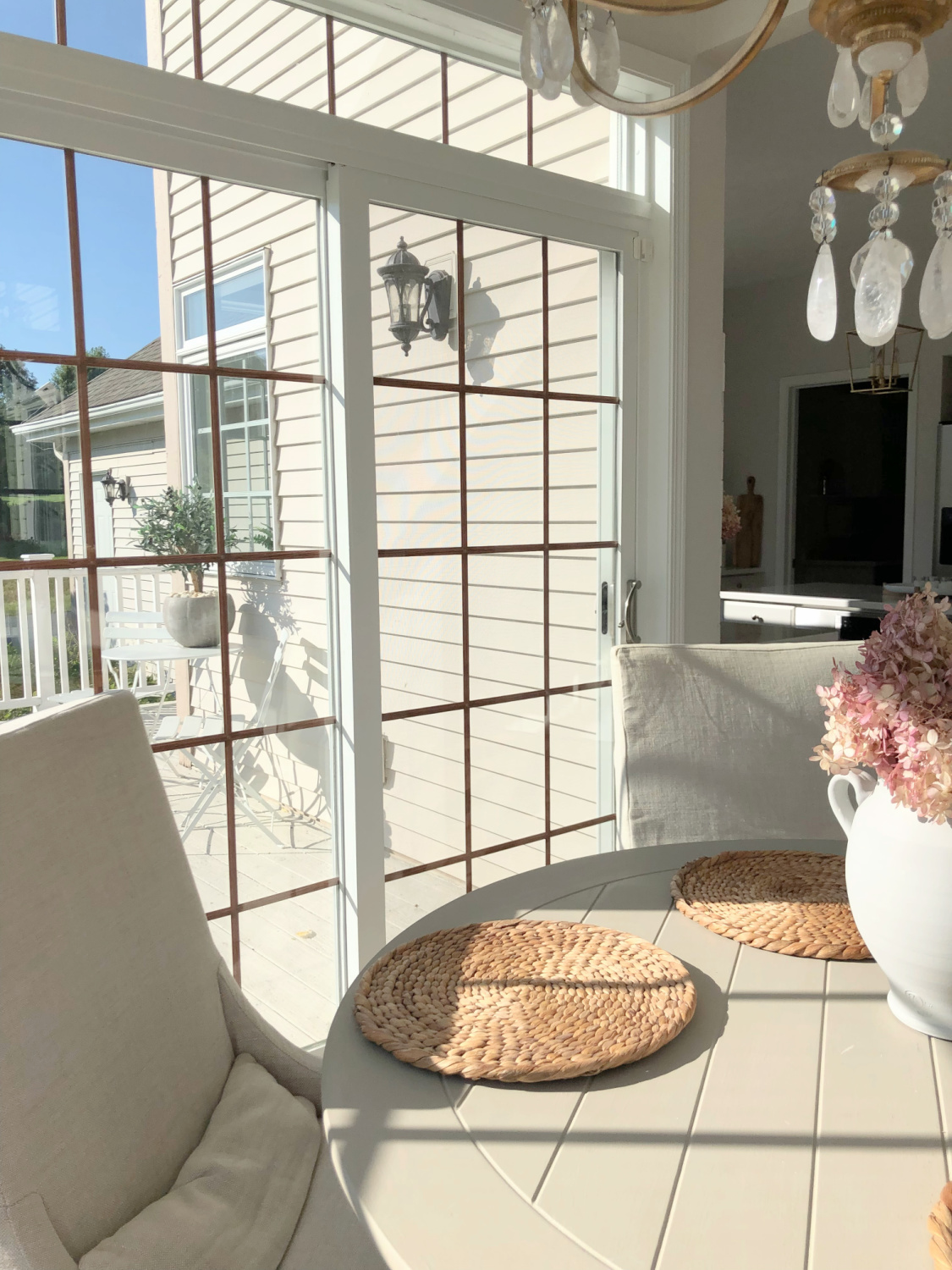 View of deck from breakfast nook at our renovated Georgian home - Hello Lovely Studio. #eiderwhite #modernfrench #europeancountry #viateramuse