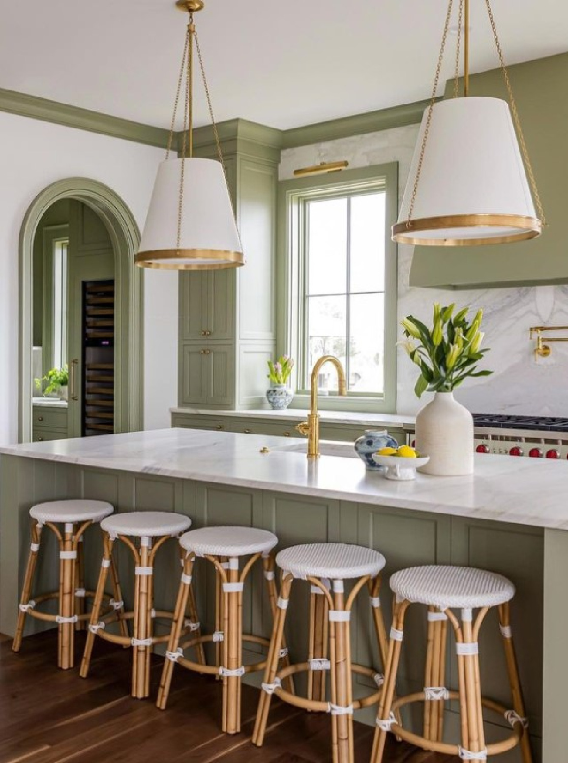 Elegant green kitchen with unlacquered brass in @chdmag by @ag.interiors (photo: @calliecocreative). Farrow & Ball Lichen. #greenkitchens