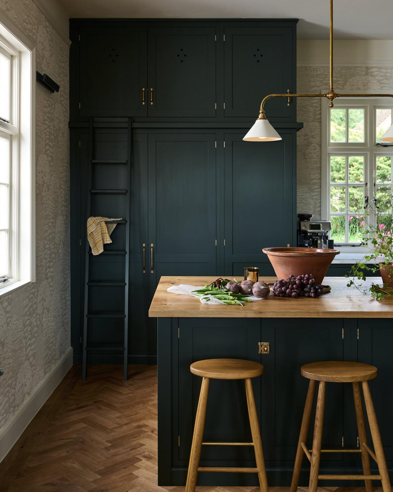 Helen's Stool, an oak stool with brass foot rail by deVOL. #englishcountrykitchen #bespokekitchens #rusticwoodstool