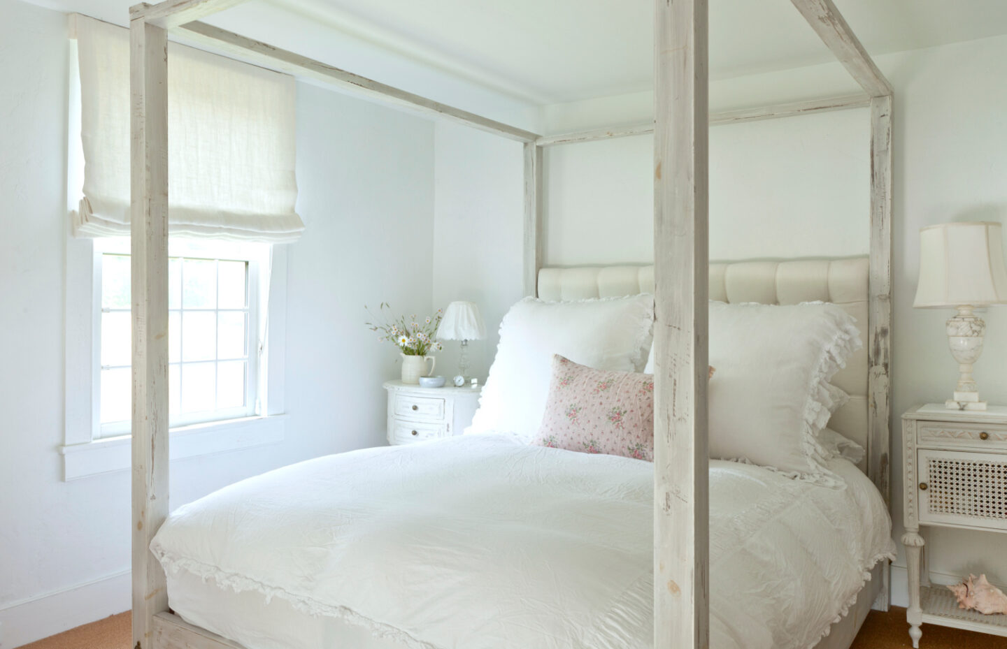 Serene, romantic, ethereal white bedroom from Fifi O'Neill's SHADES OF WHITE (CICO Books, 2021). #fifioneill #whiteinteriors