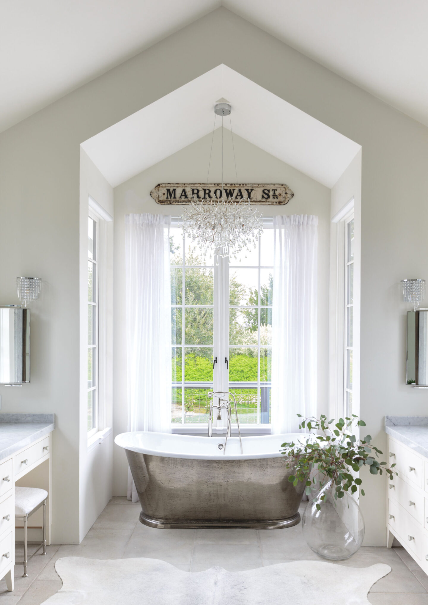 Luxurious white bath with soaking tub and serene decor - from Fifi O'Neill's SHADES OF WHITE (CICO Books, 2021). #fifioneill