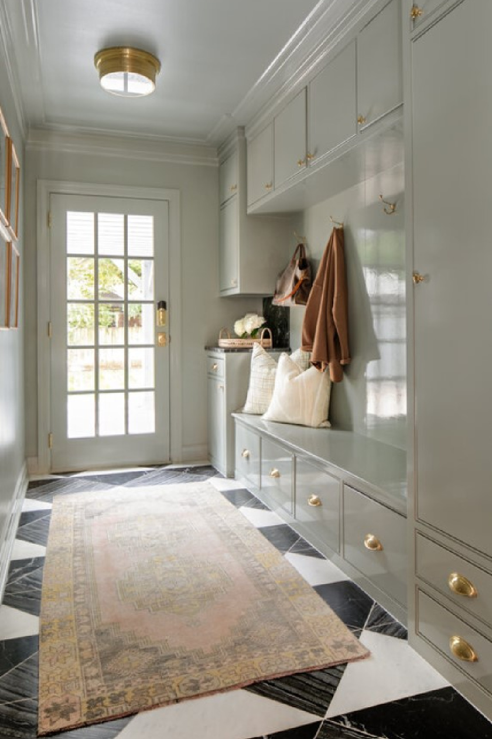 Farrow & Ball Pigeon in a lovely mud room area by Brown Interiors (Emily Hart photo). #farrowandballpigeon #mudroomgoals