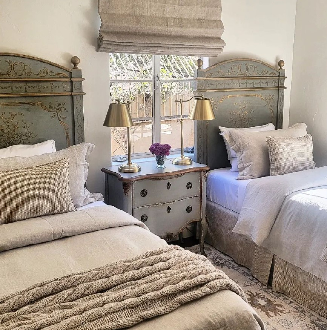 Lovely French country bedroom with twin beds in French blue - design by Jennifer Lincoln-Cutler @thefrenchnestcointeriordesign. #frenchcountry #frenchbedroom