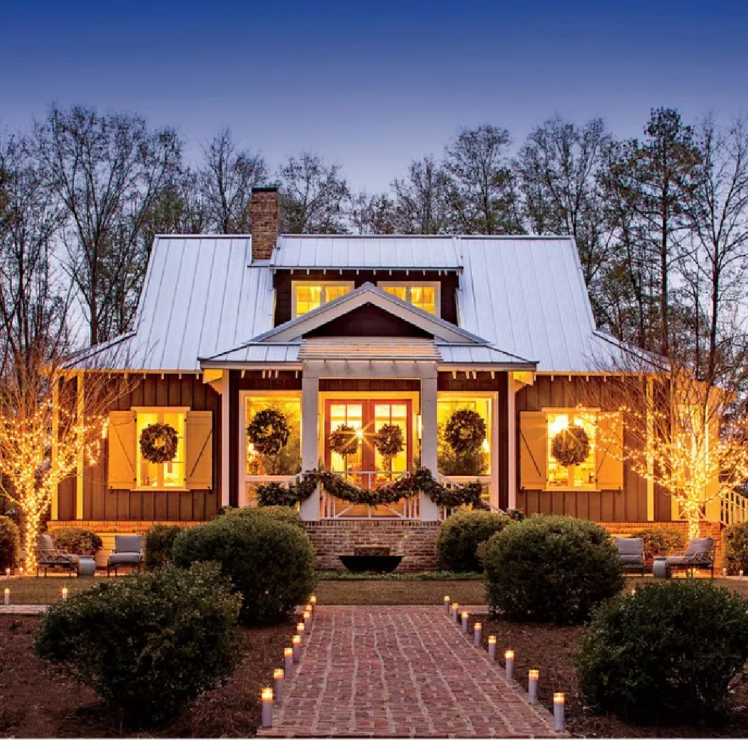 James Farmer's lovely Southern cottage exterior decorated for Christmas in Perry, Georgia. Photo: Laurey Glenn for Southern Living. #christmascottage #holidaydecorations #southerncottage