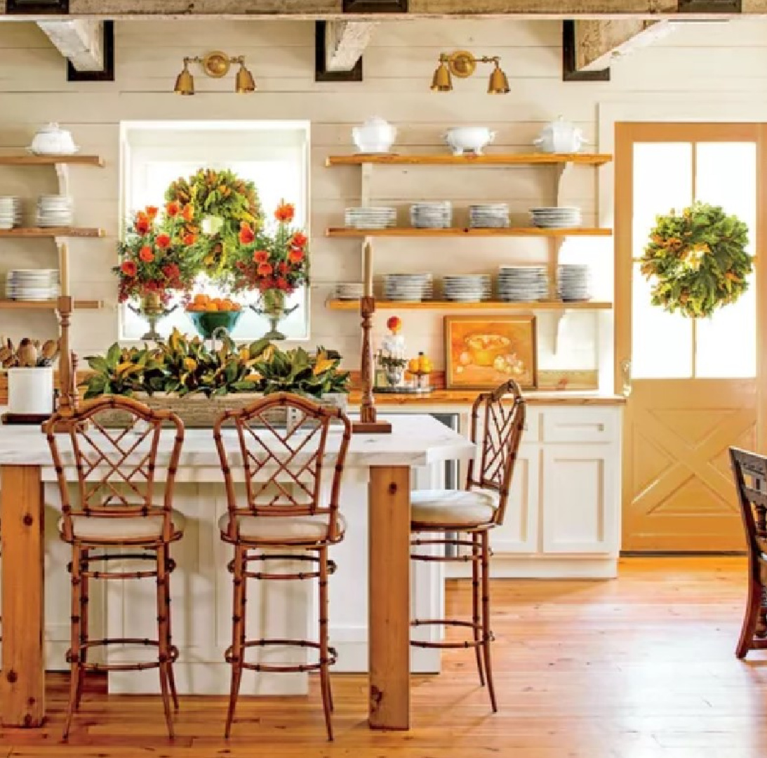 James Farmer designed Southern kitchen decorated for Christmas with open shelving and natural whimsical flourishes - Southern Living. #holidaykitchen #SouthernChristmas