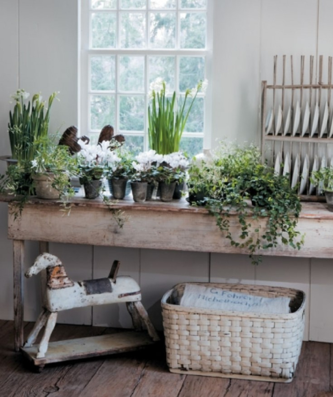 Nancy Fishelson's beautiful renovated New England farmhouse filled with liberal doses of white, simplicity, and antiques.