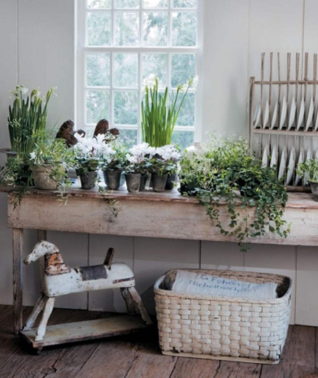 Primitive American antiques and plants in 1700s Connecticut cottage of Nancy Fishelson in CTCG (Feb 2012).