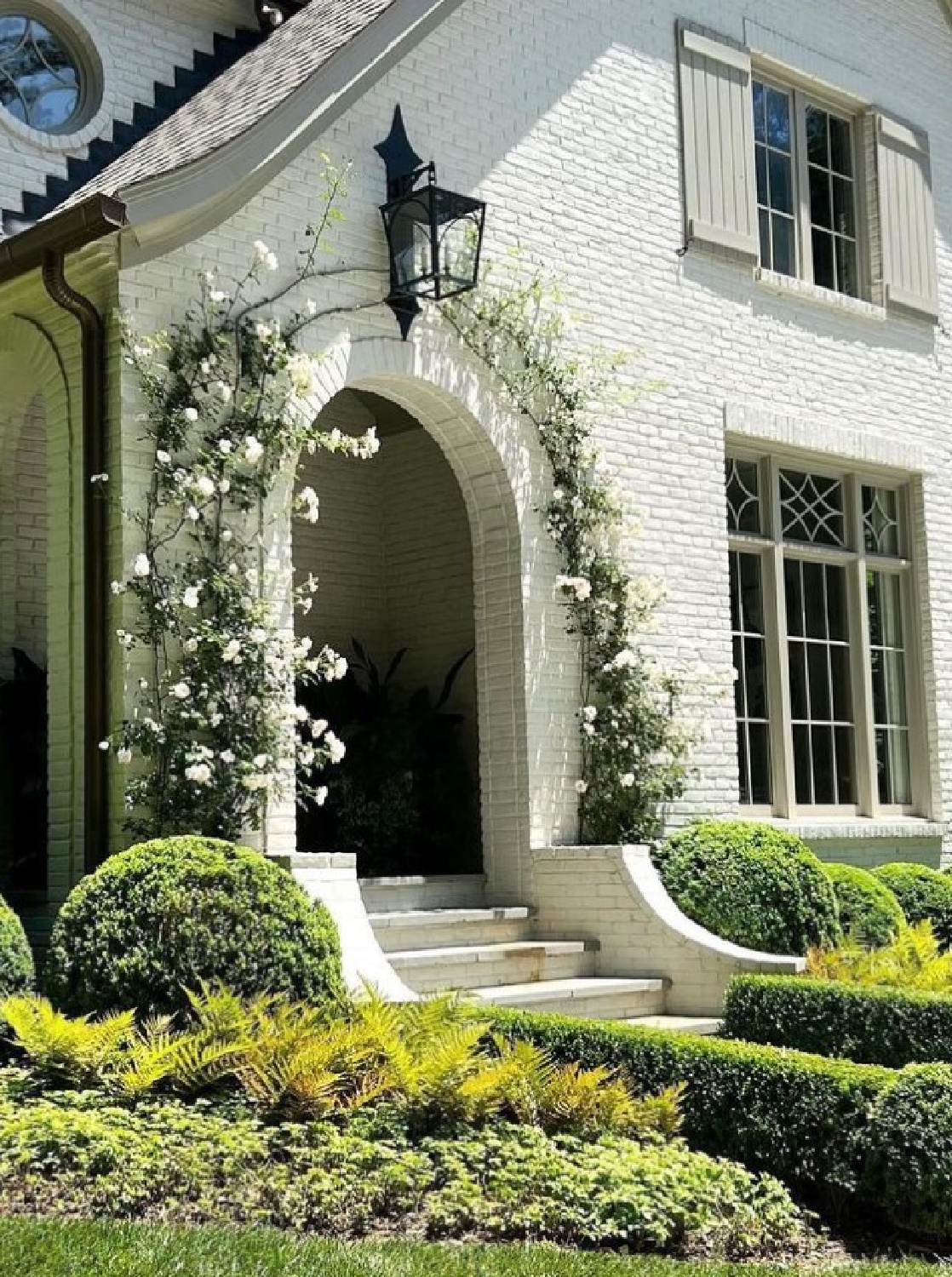 BM Balboa Mist painted brick exterior of a beautiful Tudor in Atlanta (Linda MacArthur Architect) renovated by Ladisic Fine Homes & Sherry Hart. #balboamist