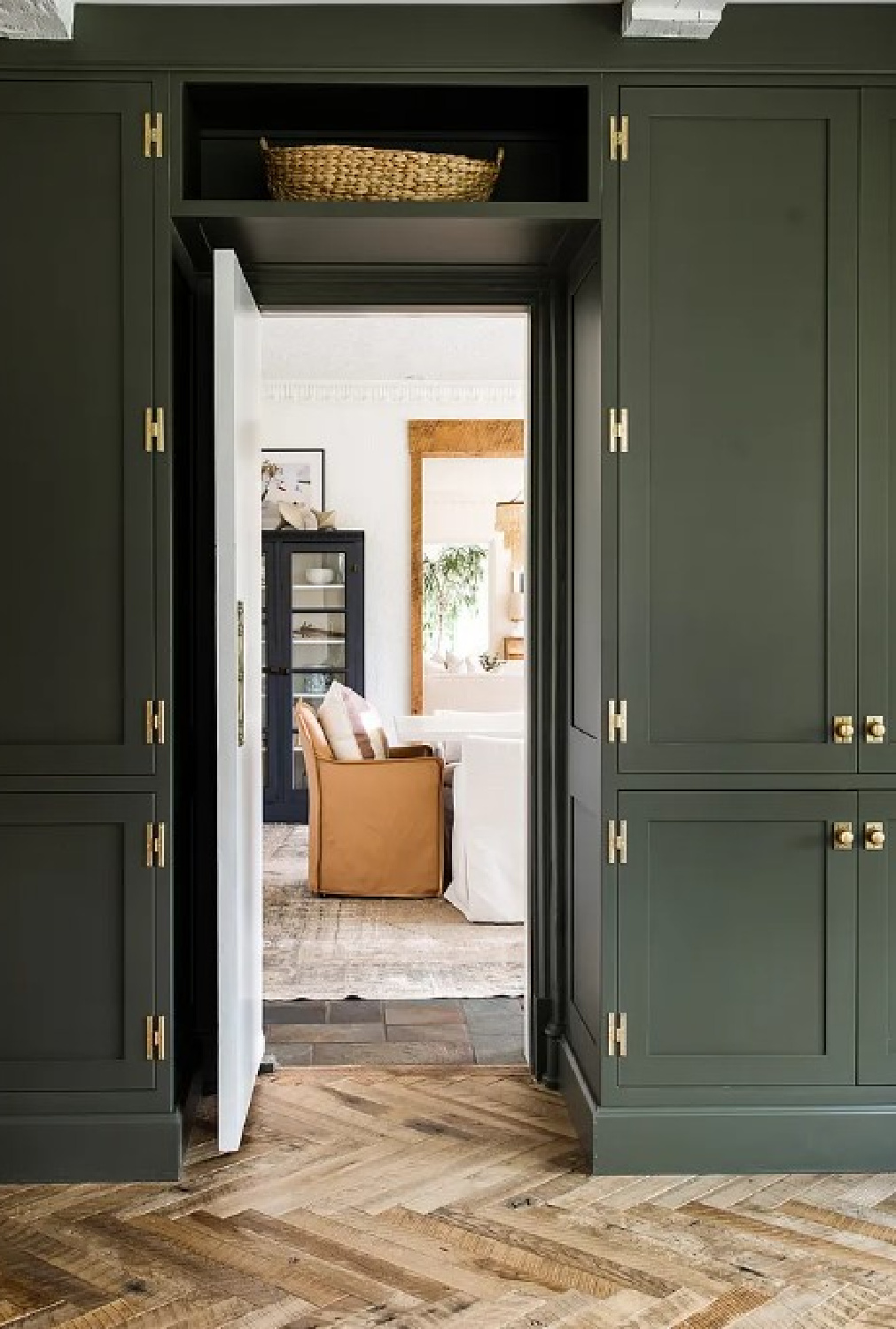 BM Dark Olive in kitchen of Kate Marker's 1920 white stucco Barrington Hills, IL Home (160 N. Buckley Rd) with modern, serene, unfussy, timeless interiors. #bmdarkolive @thedawnmckennagroup #katemarkerhome