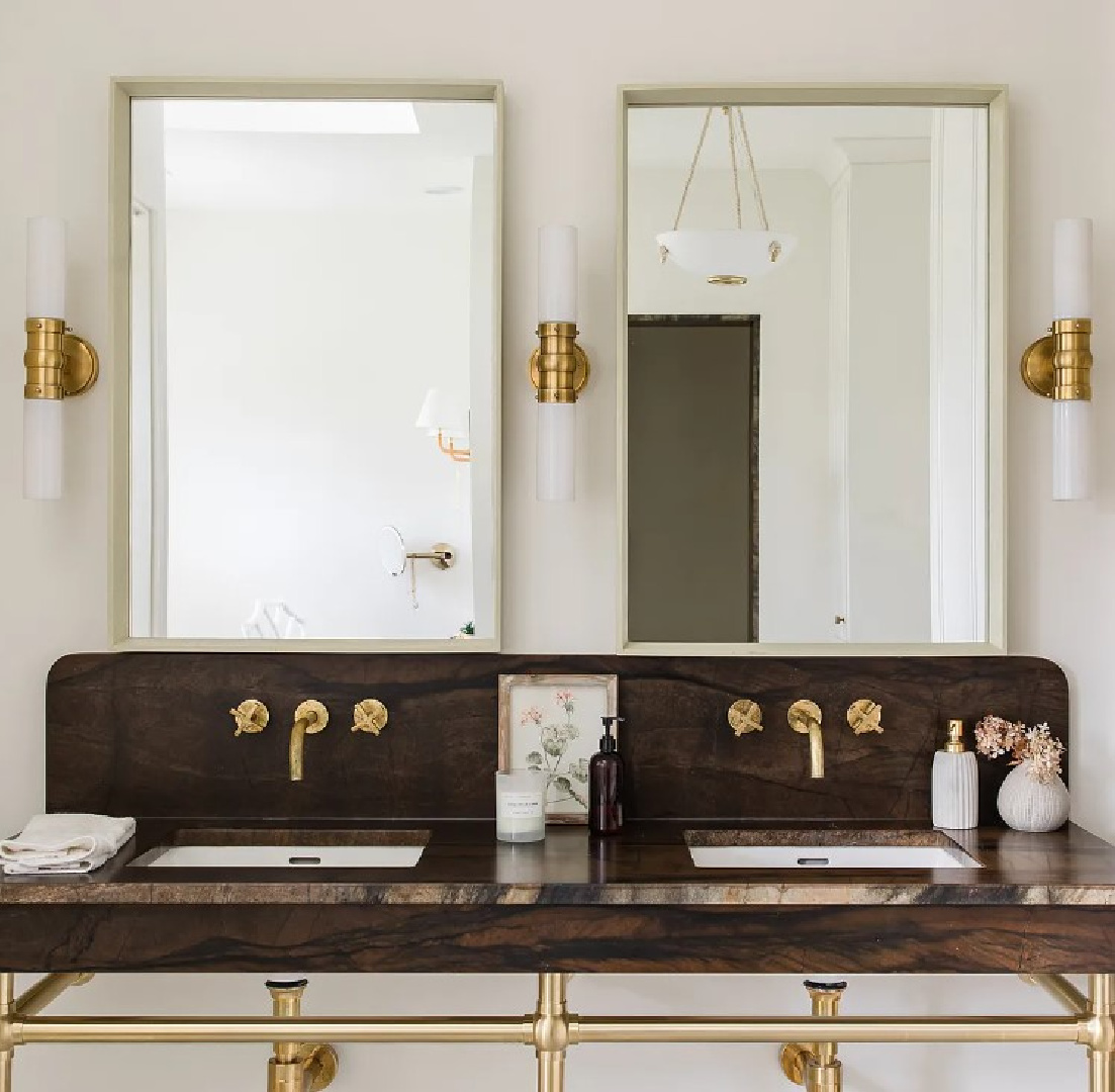 Luxurious double console sink in Kate Marker's 1920 white stucco Barrington Hills Home (160 N. Buckley Rd) with modern, serene, unfussy, timeless interiors. #katemarkerinteriors @thedawnmckennagroup #katemarkerhome