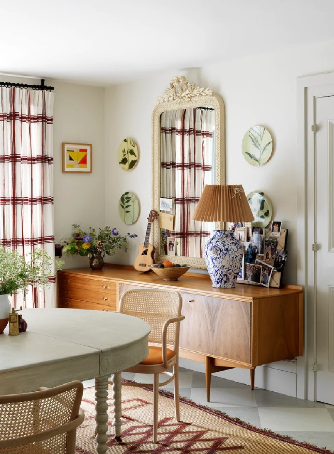 MCM console in a gorgeous dining area designed by Beata Heuman; photo by Simon Brown.