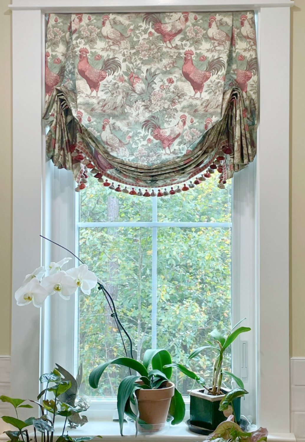 French country kitchen with custom chicken toile London shades, white cabinets, and quartzite counters - Hello Lovely Studio. #frenchcountrykitchen