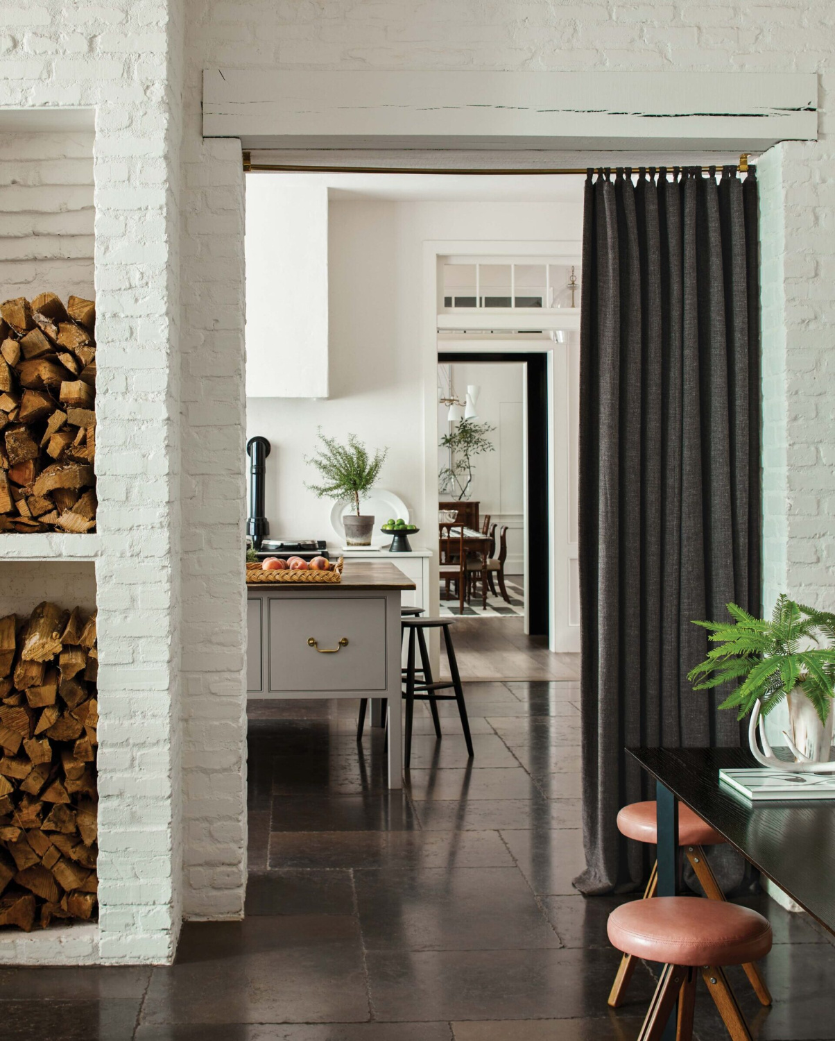 Curtain in a doorway of an Atlanta kitchen - architecture by Stanley Dixon; interior design: Carolyn Malone. Photo: Eric Piasecki.