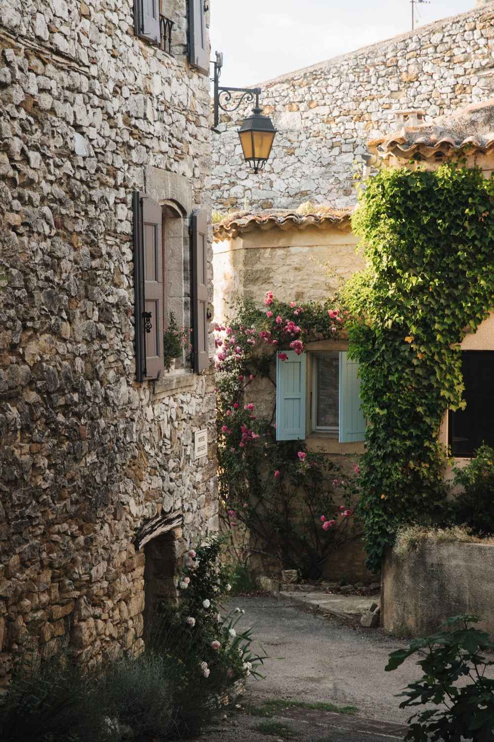 A romantic country French exterior from Provence in THE FLOWERS OF PROVENCE by Jamie Beck. #provencestyle #flowersofprovence #jamiebeck