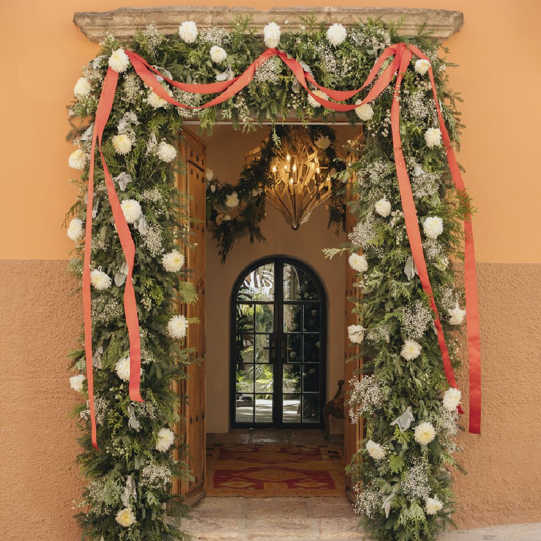 Jeffry Weisman holiday garland with cedar and chrysanthemum in Veranda (Maureen M. Evans). #christmasgarland