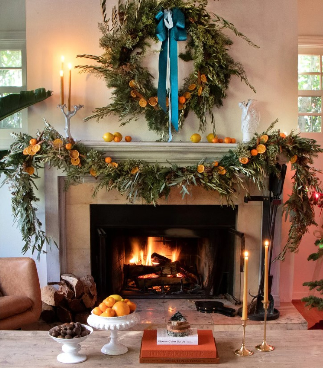 Michael Putnam designed holiday arrangements in Veranda. #holidayfireplace