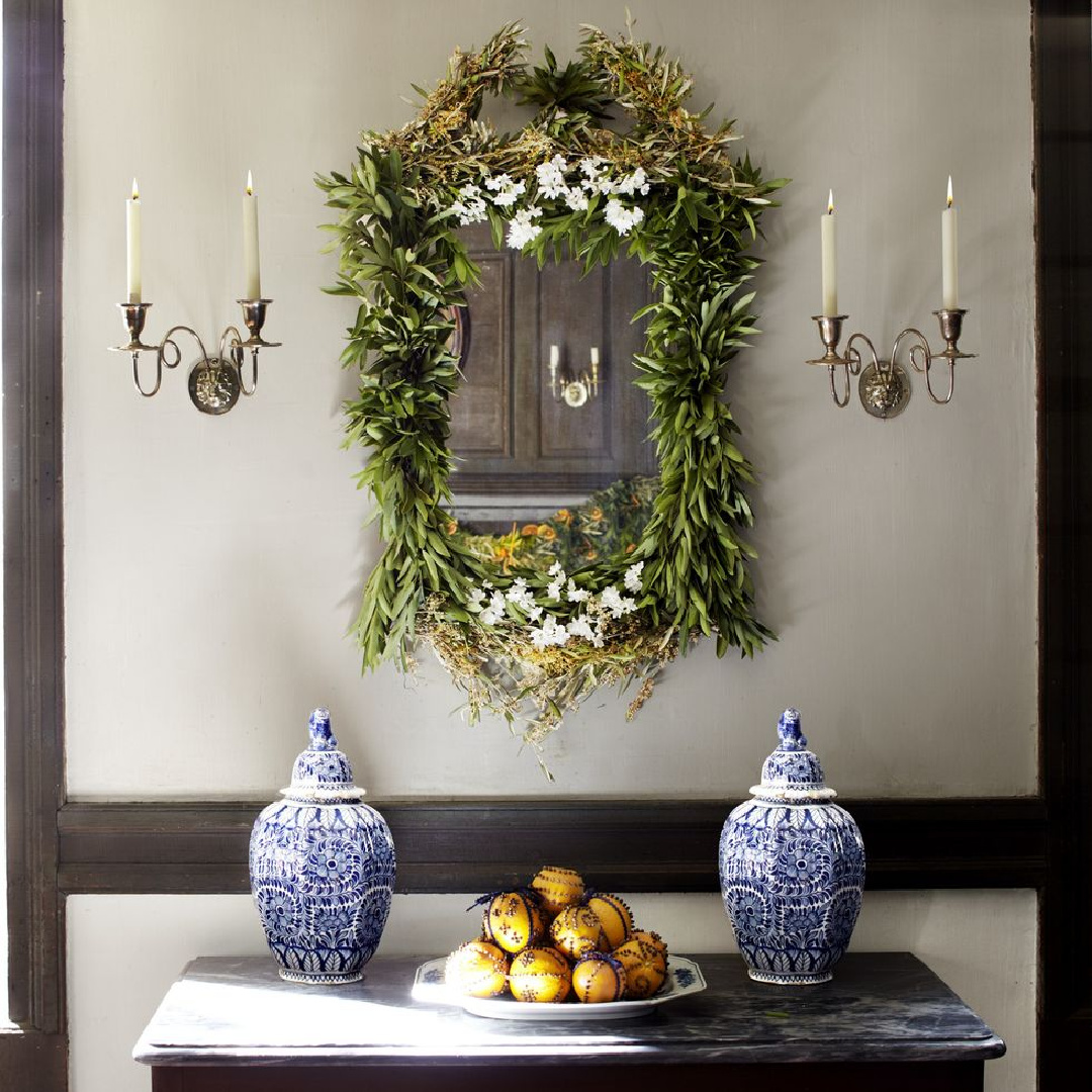 Michael Putnam designed holiday garland on mirror - Veranda (Sang An). #holidaygarland #elegantchristmas