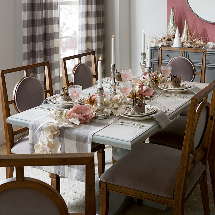 Holiday dining tablescape with white paper floral garland - Ballard Designs.