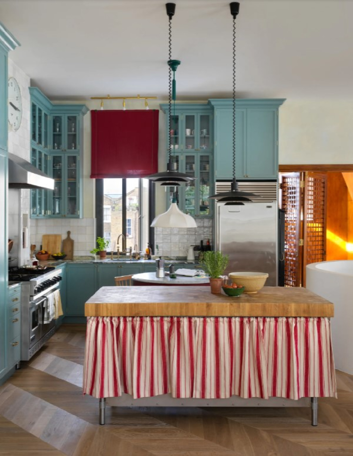 Farrow & Ball Oval Room Blue on kitchen cabinets in a London home Beata Heuman designed. #ovalroomblue #bluekitchencabinets