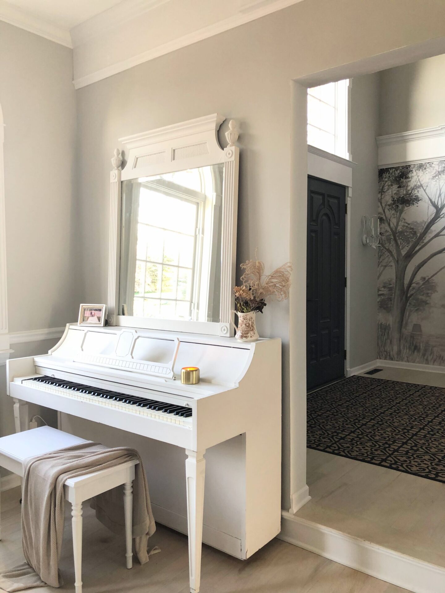 Piano in my music room (paint color is SW Repose Gray) at the Georgian - Hello Lovely Studio. #swreposegray #sherwinwilliamsreposegray
