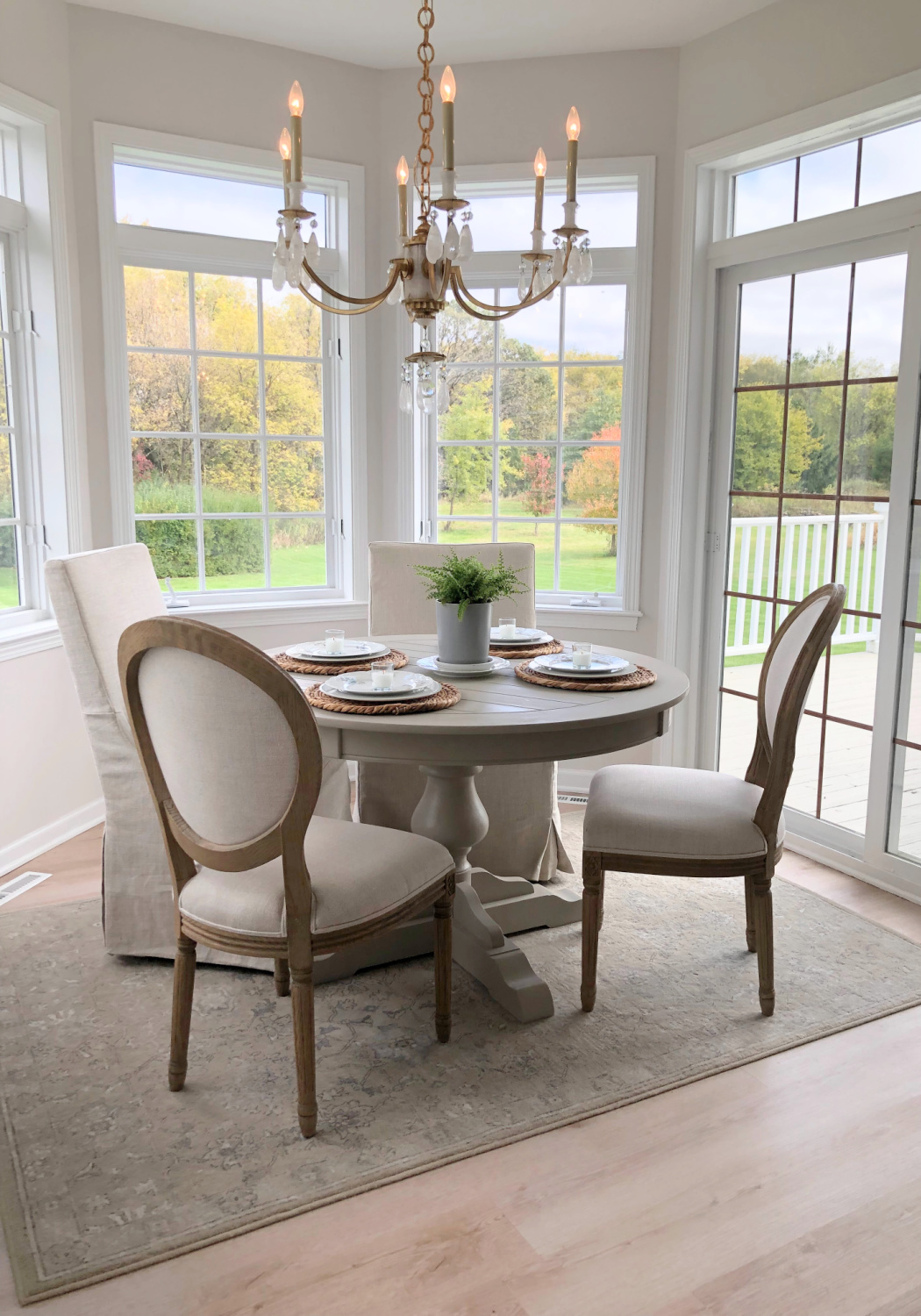 Breakfast nook in Hello Lovely's modern French kitchen in fall.