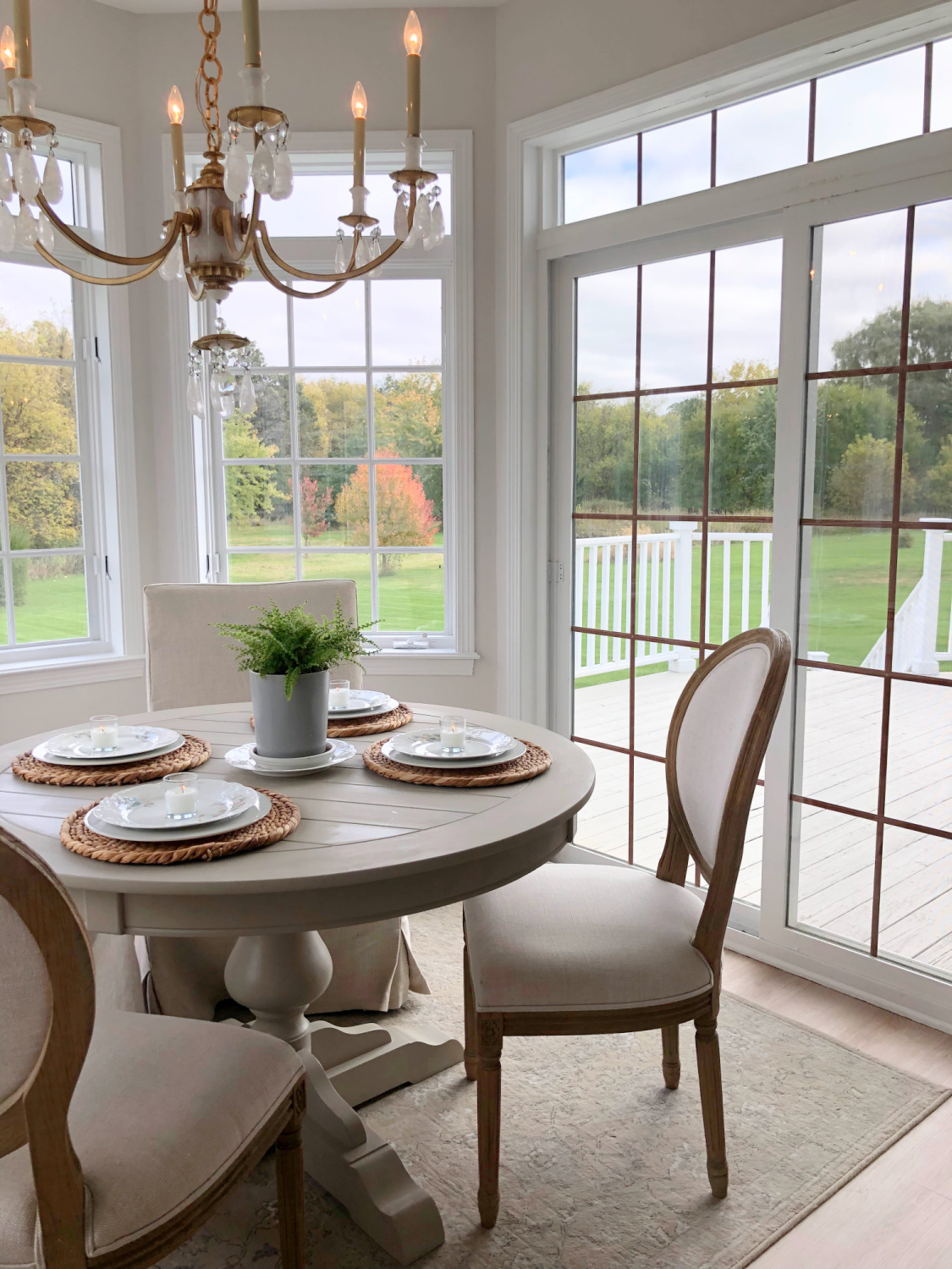 Breakfast nook in Hello Lovely's modern French kitchen in fall.