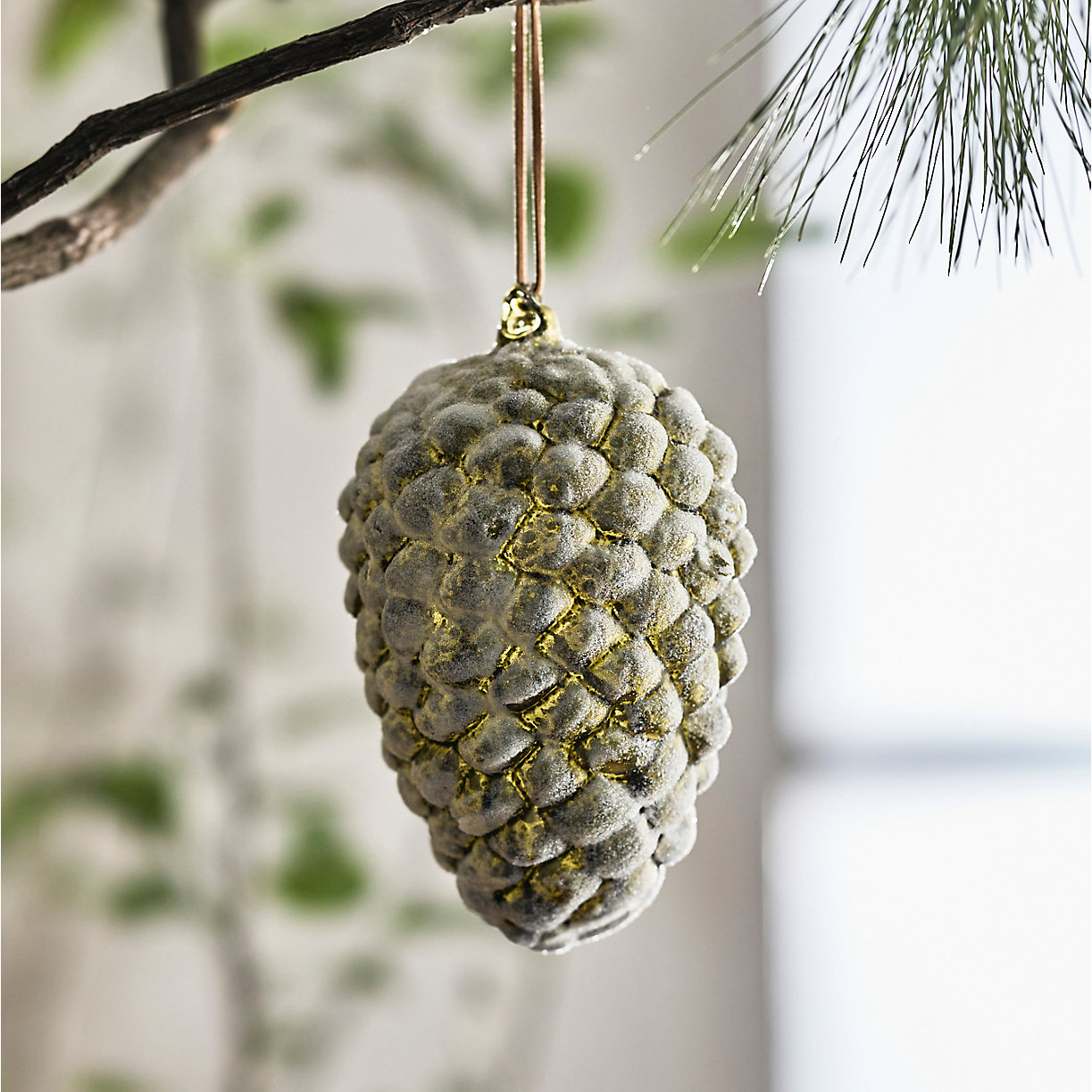 Icy green pinecone ornament, Terrain.