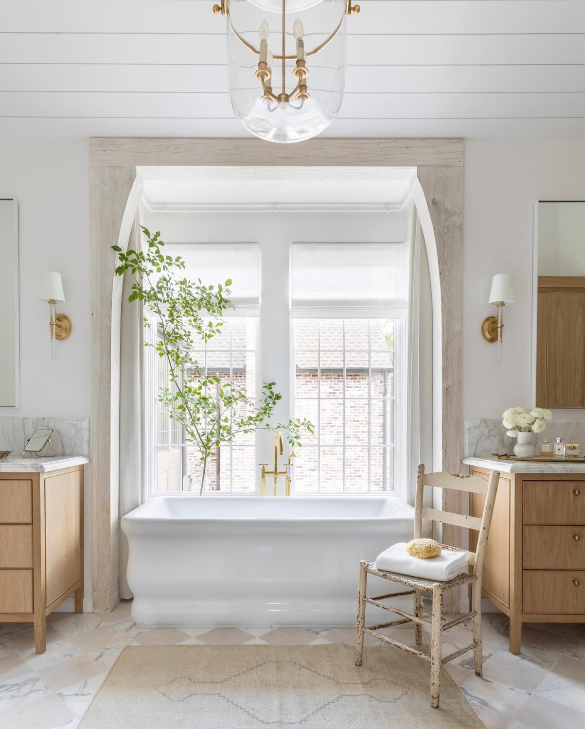 Freshly sophisticated and classic, a luxurious bath by Marie Flanigan Interiors.