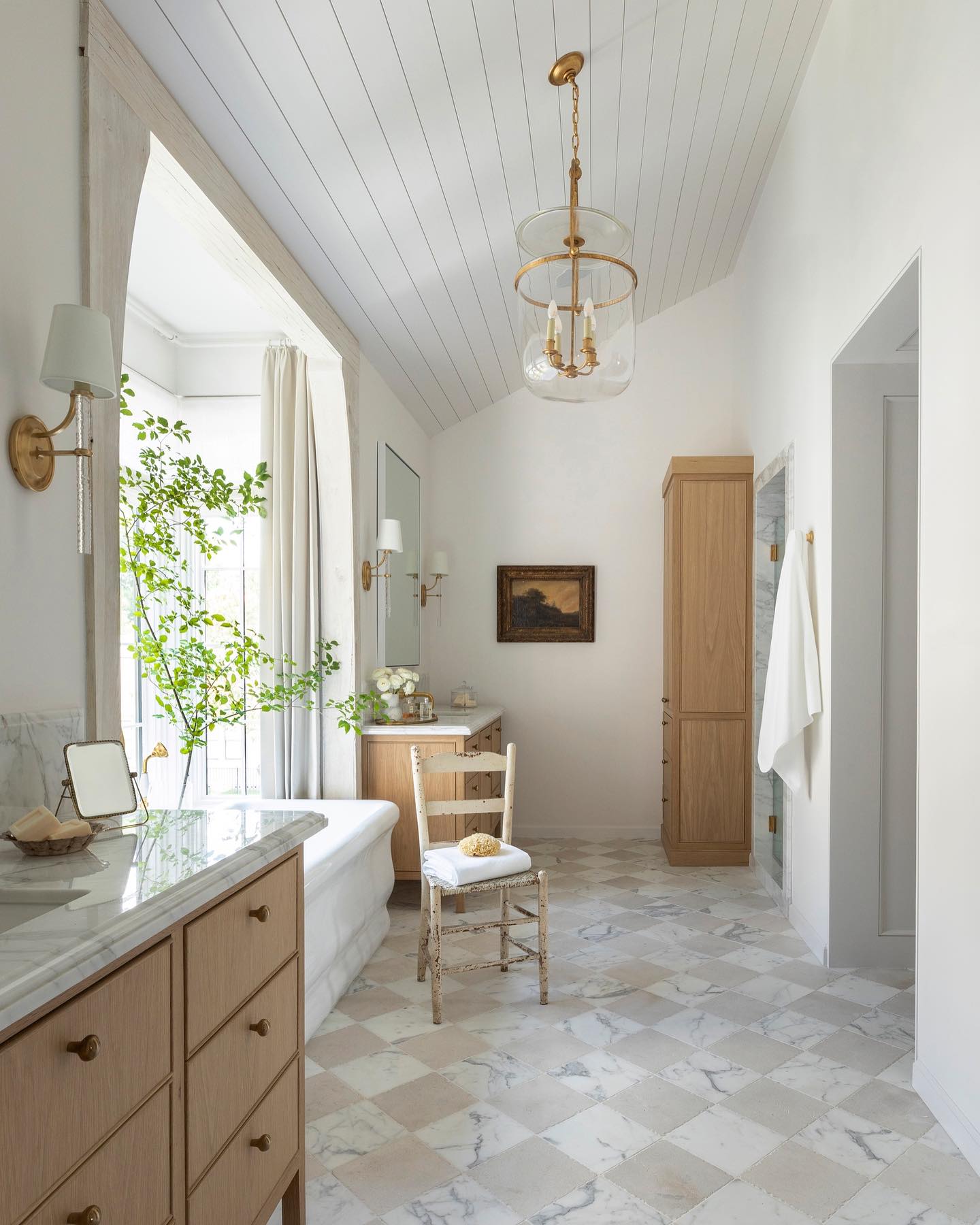 Freshly sophisticated and classic, a luxurious bath by Marie Flanigan Interiors.