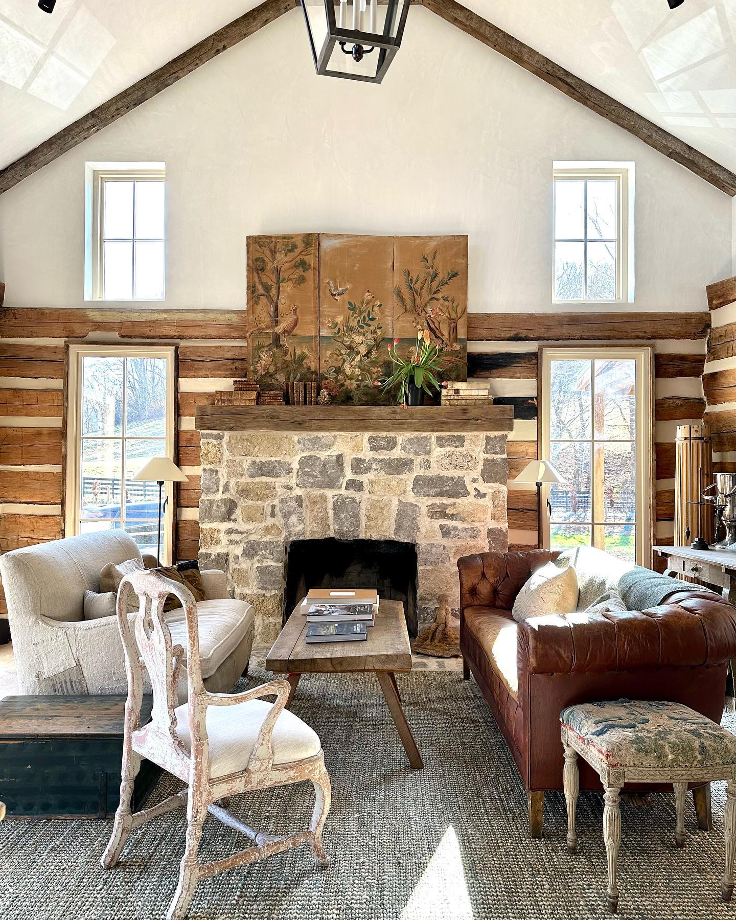 Beautiful log cabin interior in Leiper's Fork, Tennessee by Brooke and Steve Giannetti of Patina Home & Garden.