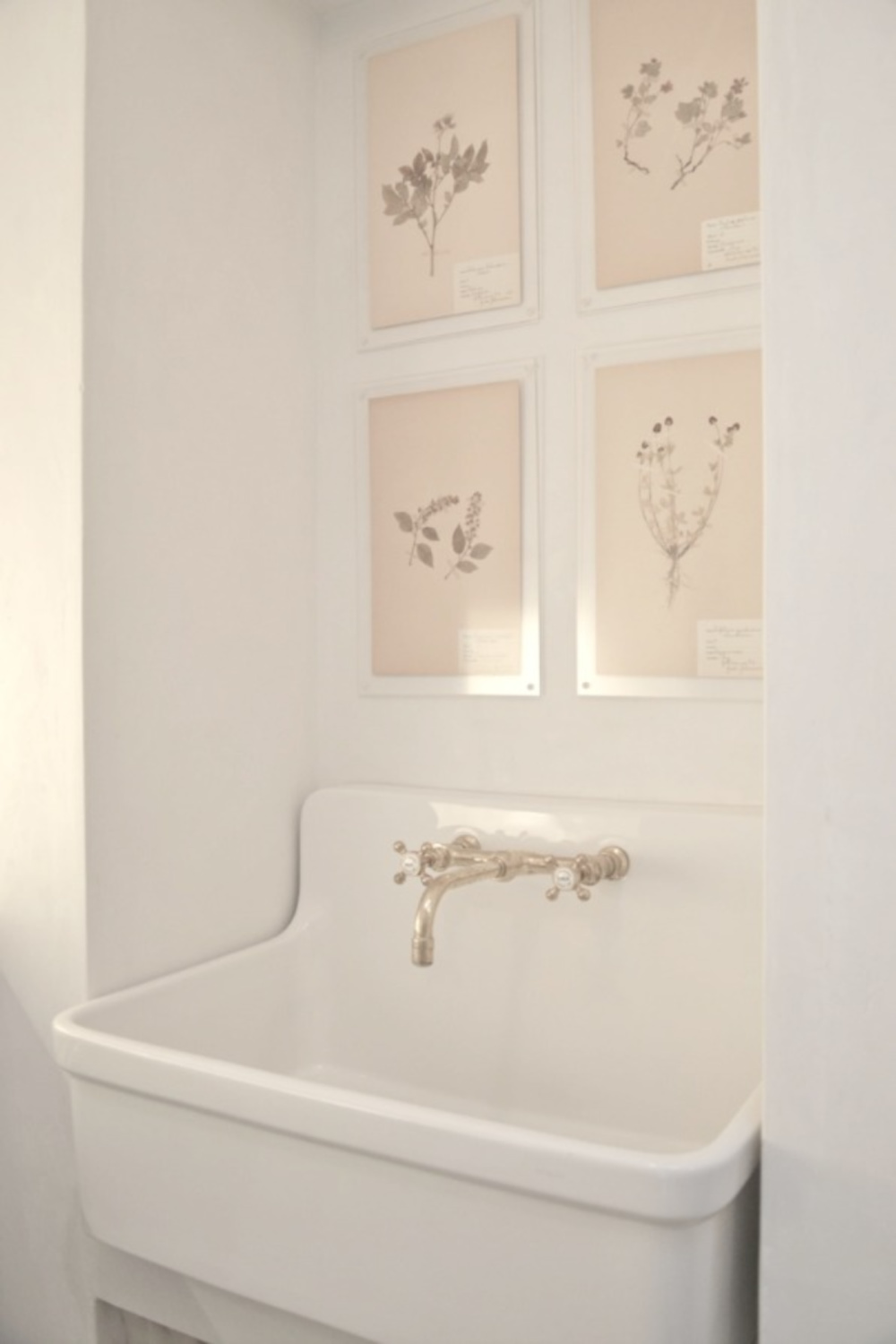 Kohler Gilford sink with botanical prints in Brooke Giannetti Patina Farm laundry room. #patinafarm