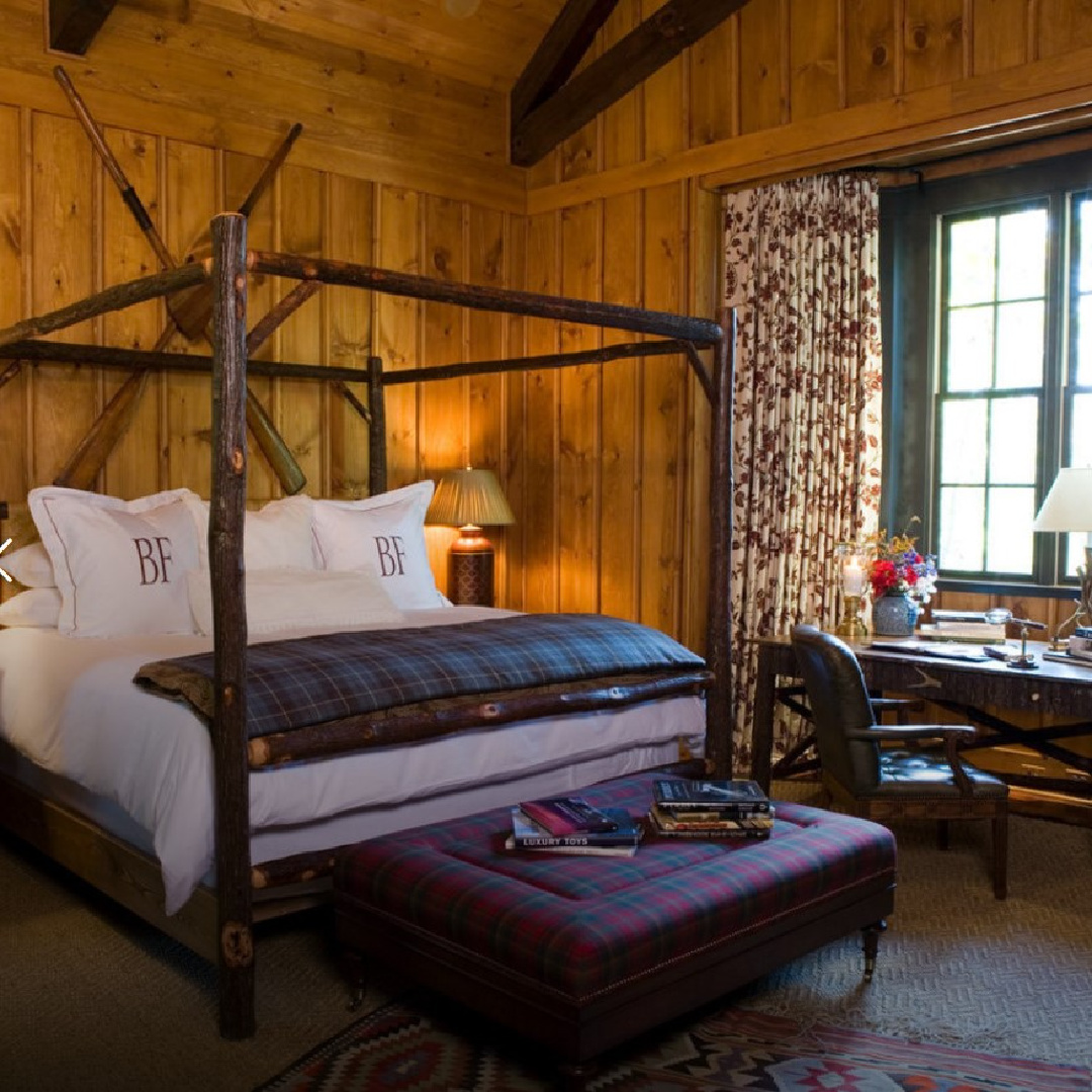 Blackberry Farm (Tennessee) Hill Cottage bedroom with rustic wood walls and luxurious high end American country design details. #blackberryfarm #rusticinteriors #cozyinteriors