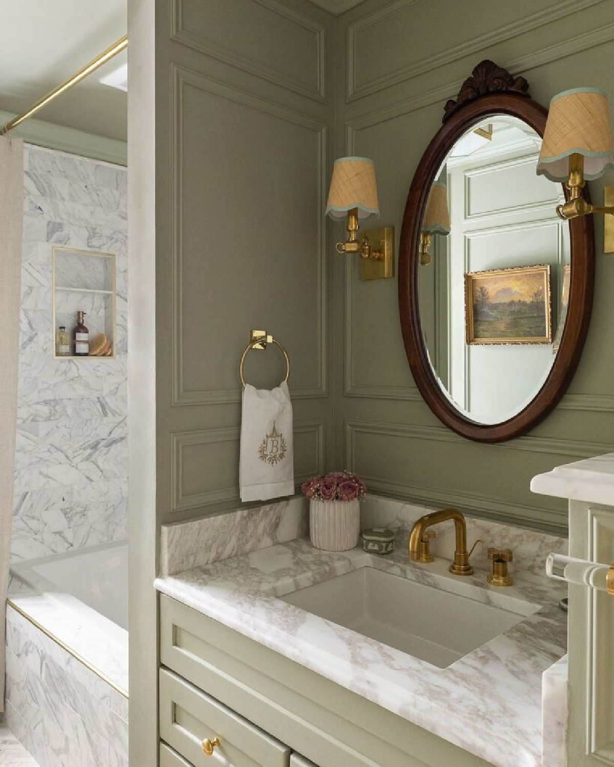 Alisa Bovino designed warm green-gray bath with white marble. #europeancottage #elegantbath #rusticelegance #bathroomdesign