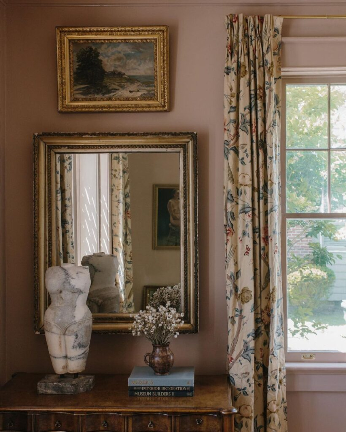 Carley Page Summers designed warm cozy European country interior with rosy pink walls. #europeancottage #warmcozyinteriors #rusticelegance #europeancountry