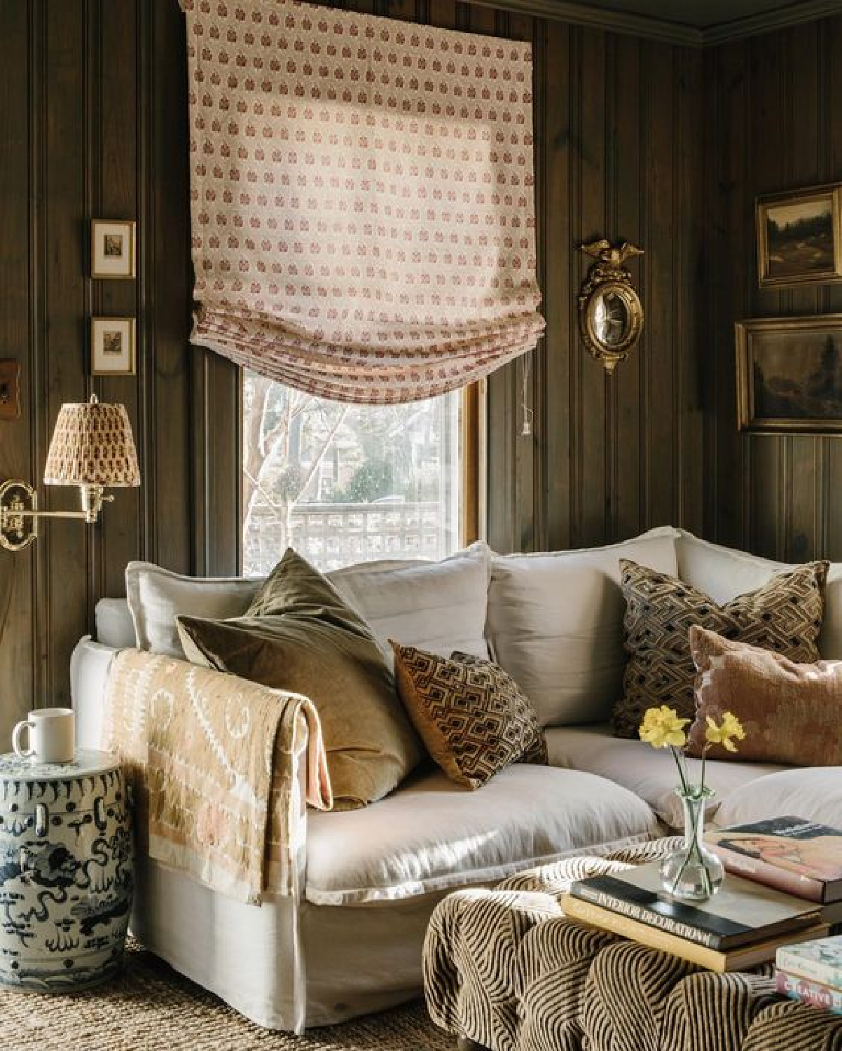 Carley Page Summers European country living space with warm colors and traditional charm. #europeancottage #warmcozyinteriors #rusticelegance #europeancountry