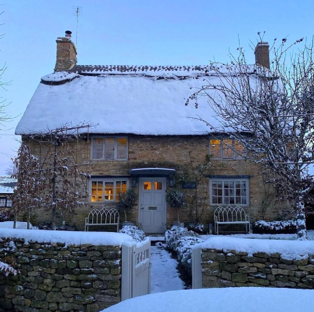 Osborne Interiors Cotswold cottage exterior with all of The Holiday movie cozy winter vibes. #cotswoldcottage #theholidaymovie #oldstonecottage #englishcountrycottage