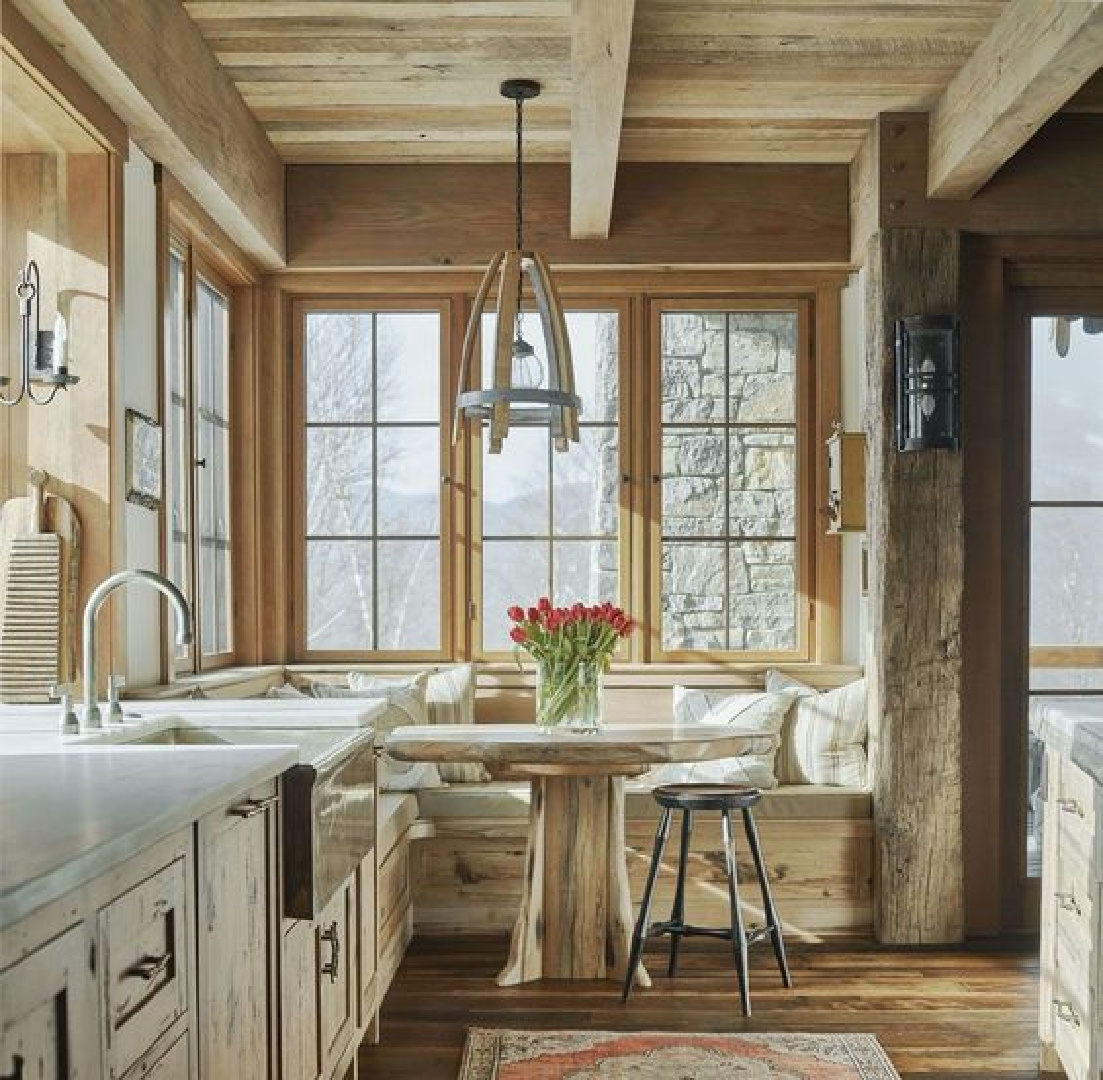 Cushman Design Group cozy breakfast nook in a rustic Vermont kitchen with winter cabin vibes and mountain chic. #europeancottage #breakfastnooks #rusticelegance #europeancountry