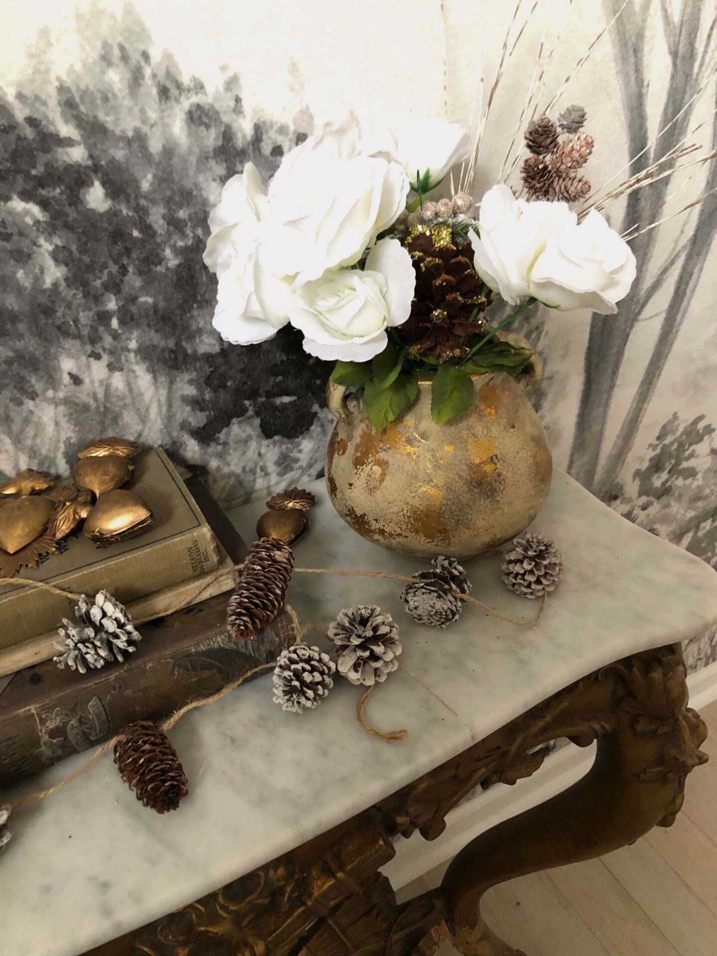 Christmas decor on a French antique console in my foyer - Hello Lovely Studio. #modernfrench #frenchchristmas
