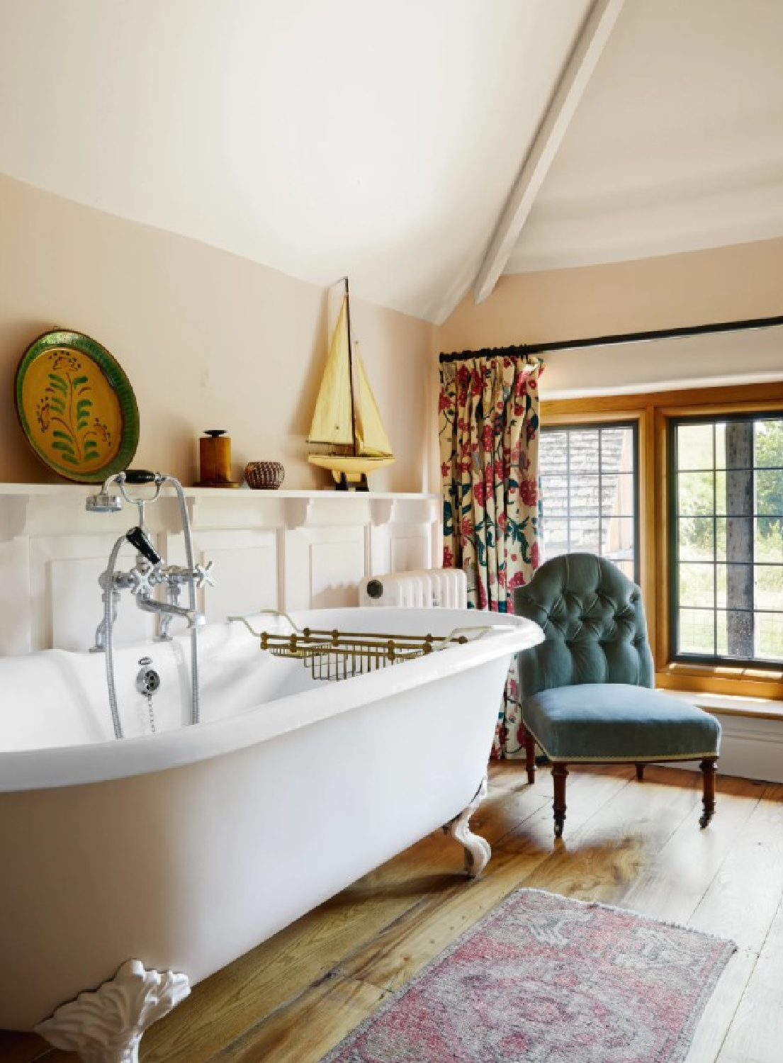 Farrow & Ball Pink Ground bath with clawfoot tub, wood floors, and velvet chair - House and Garden magazine. #pinkground #pinkpaintcolors