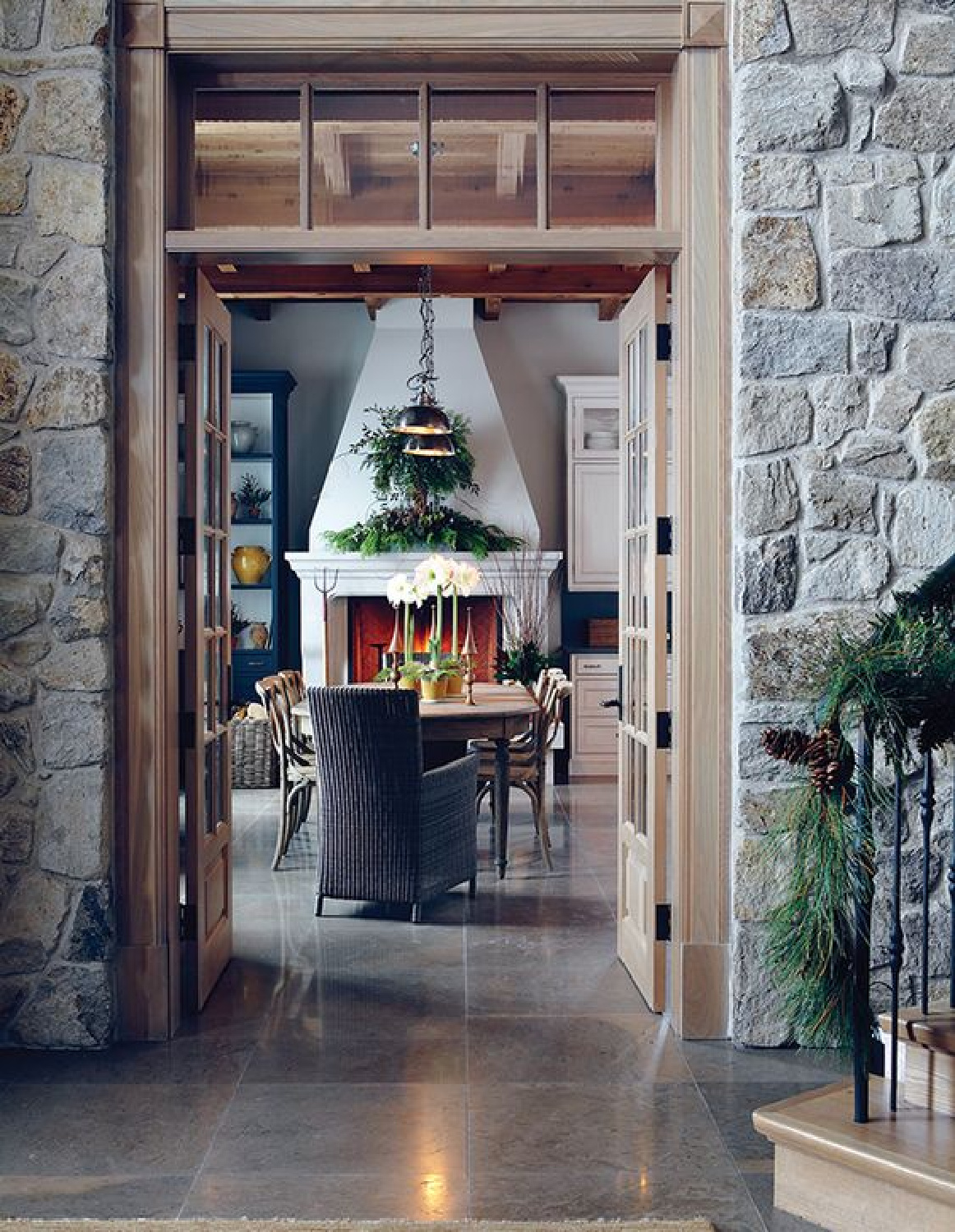 House and Home - mountain rustic cabin holiday Christmas decor with stone walls and stunning architecture.