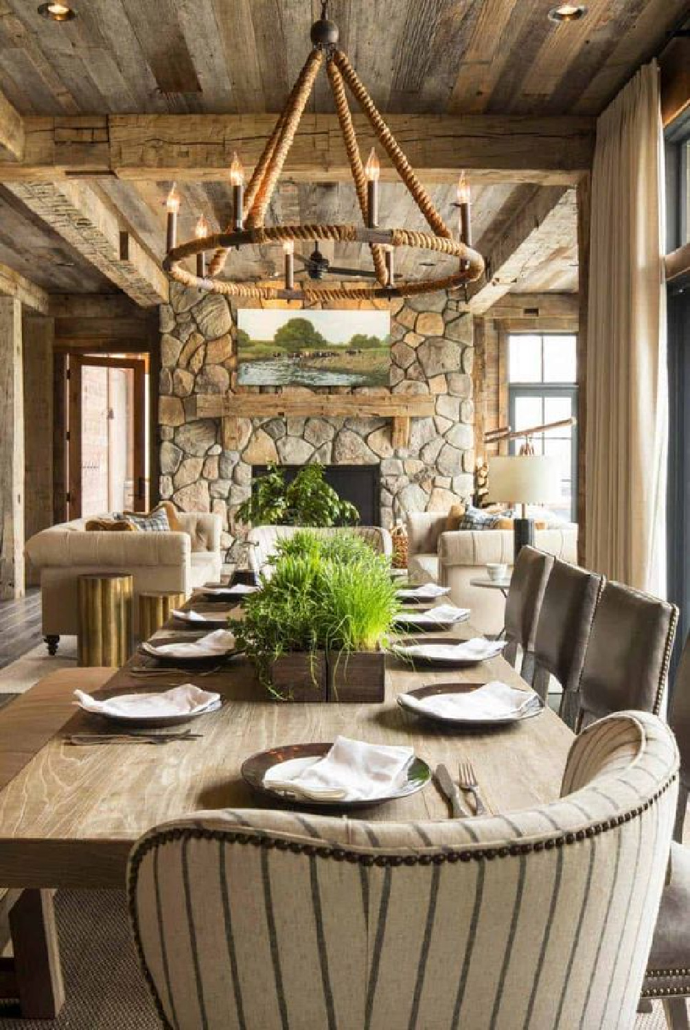 Martha O'Hara Interiors - lakehouse great room in a Wisconsin lakehouse has beautiful river rock fireplace and rustic elegance. #lakehouse #cozyretreats #rusticelegance