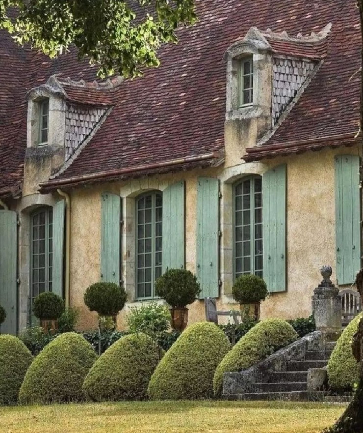 Beautiful European country Old World style exterior with green shutters and dormers - via Roman and Ivy. #oldworldstyle #houseexteriors #europeancountry